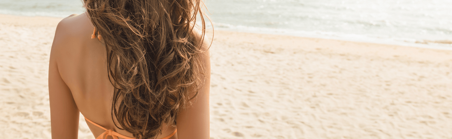 Astuces cheveux été, protection solaire, hydratation capillaire.